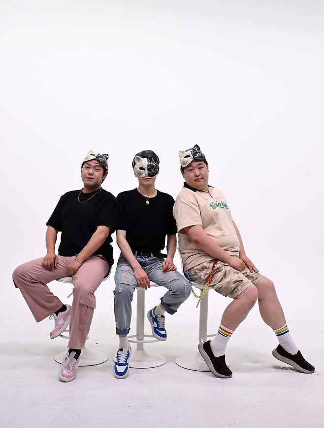 From left: Lionesses members Damjun, Kanghan, and Lee Marlang pose for a photo during the interview with The Korea Herald. (Lee Sang-sub/The Korea Herald)