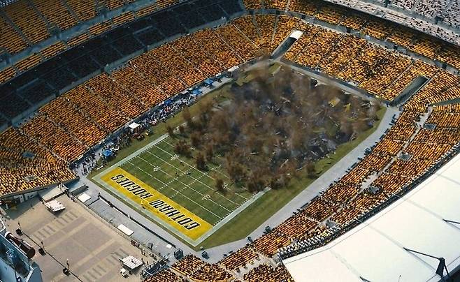 영화 ‘다크 나이트 라이즈’의 미식축구장 폭파 장면.