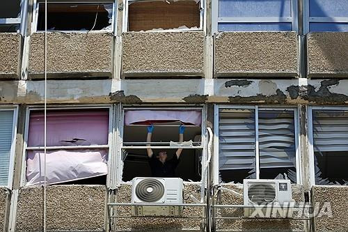 드론 공격 받은 텔아비브의 한 빌딩 [신화=연합뉴스 자료사진. 재판매 및 DB 금지]