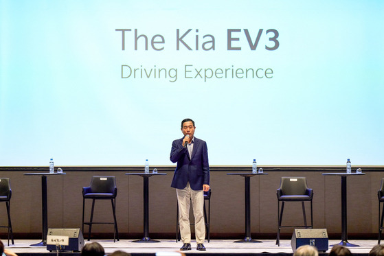 Jeong Won-jeong, head of domestic sales at Kia, introduces the EV3 during a press conference after a press test drive session on July 23 in Sokcho, Gyeonggi. [KIA]