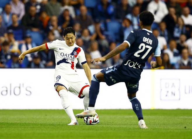 Soccer Football - Ligue 1 - Le Havre v Paris St Germain - Stade Oceane, Le Havre, France - August 16, 2024  Paris St Germain's Lee Kang-in scores their first goal REUTERS/Abdul Saboor







<저작권자(c) 연합뉴스, 무단 전재-재배포, AI 학습 및 활용 금지>