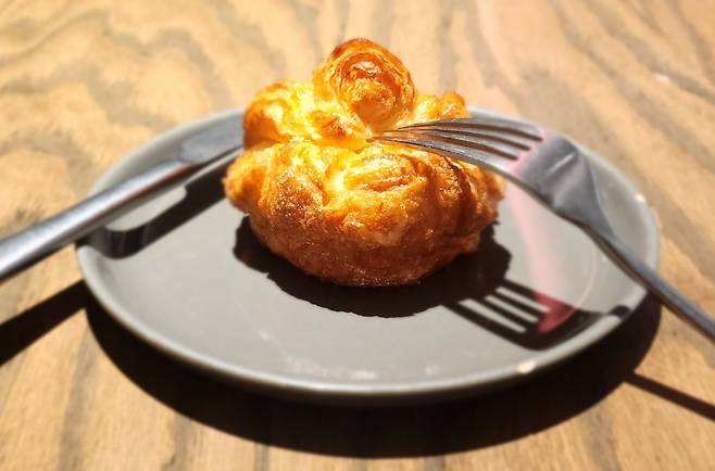 Kouign-amann at b. Patisserie at Shinsegae Central City in Seocho-gu, Seoul. (Choi Si-young/The Korea Herald)