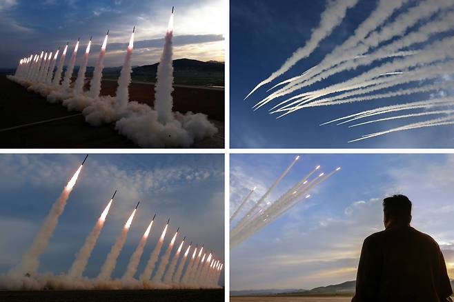 합동참모본부는 12일 북한이 동해상으로 미상의 탄도미사일을 발사했다고 밝혔다. 김정은 북한 국무위원장이 지난 5월 600㎜ 초대형방사포 위력시위사격을 현지지도한 모습. [평양 노동신문=뉴스1]