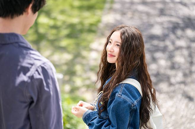 Lee Se-young, as the character Choi Hong, looks at Kentaro Sakaguchi, playing Aoki Jungo, in a scene from the drama 'What Comes After Love.'/Coupang Play