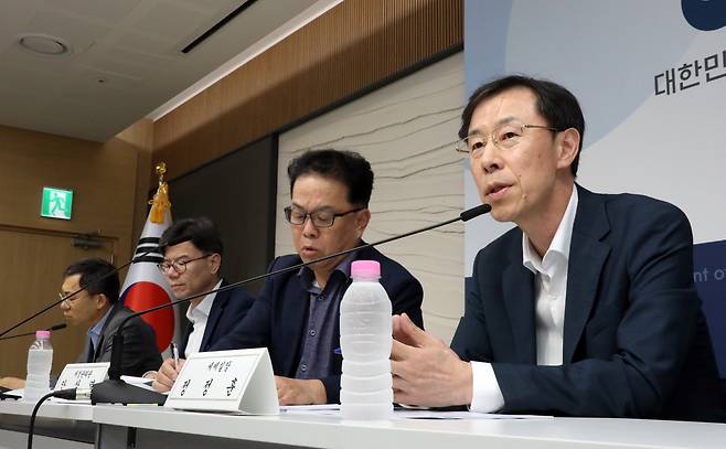 Jeong Jeong-hoon, head of the tax policy division at the Ministry of Economy and Finance briefs on the revised tax revenue estimate for 2024 at the government complex in Sejong on Wednesday. (Yonhap)