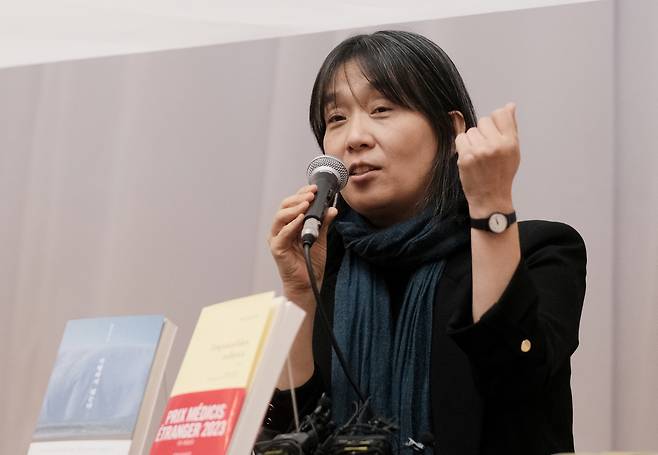 Nobel Prize winner Han Kang speaks during a press conference in 2023. [YONHAP]