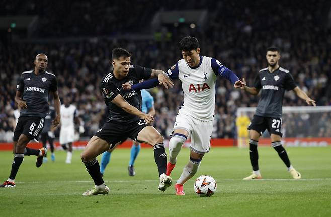 Soccer Football - Europa League - Tottenham Hotspur v Qarabag - Tottenham Hotspur Stadium, London, Britain - September 26, 2024 Tottenham Hotspur's Son Heung-min in action with Qarabag's Matheus Silva Action Images via Reuters/Peter Cziborra







<저작권자(c) 연합뉴스, 무단 전재-재배포, AI 학습 및 활용 금지>