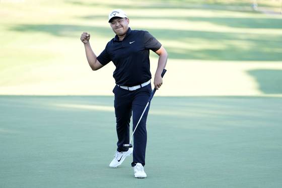 Kevin Yu of Taiwan reacts to his birdie putt on the 18th green during the final round of the Sanderson Farms Championship 2024 at the Country Club of Jackson on Oct. 6 in Jackson, Mississippi. [GETTY IMAGES]