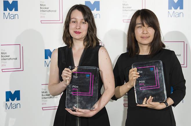 Han Kang, right, author of the winning book "The Vegetarian," poses for photographers with translator Deborah Smith at the photocall for the Man Booker International Prize in London on May 16, 2016. (Jeff Spicer/Getty Images)