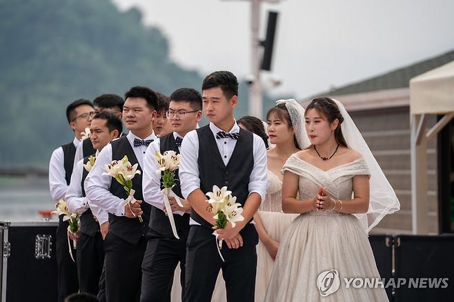 중국에서 열린 한 결혼식. <연합뉴스>