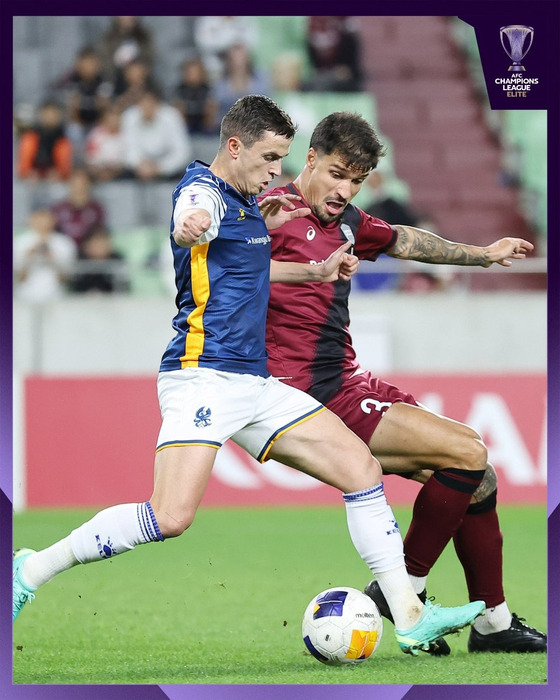 Gwangju FC's Jasir Asani, left, vies for the ball during the AFC Champions League Elite (ACLE) match against Vissel Kobe at Kobe City Misaki Park Stadium in Japan in a photo shared on the ACLE X account on Tuesday. [SCREEN CAPTURE]