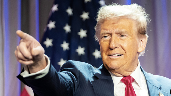 U.S. President-elect Donald Trump gestures during a meeting with House Republicans at the Hyatt Regency hotel in Washington D.C. on Wednesday. [EPA/YONHAP]