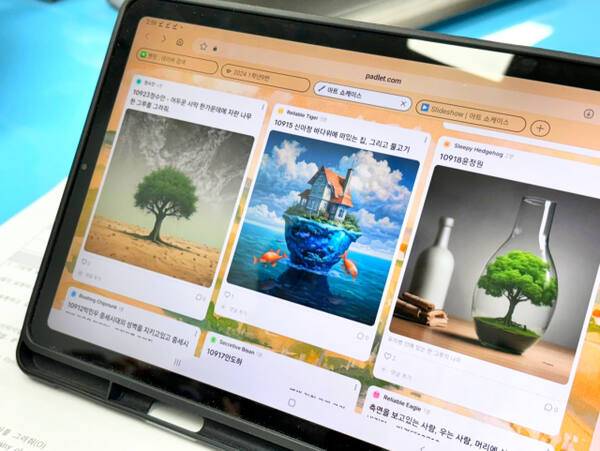 지난 8일 용인 수지구 이현중학교에서 열린 ‘이미지 생성 프로그램을 활용한 초현실주의 기법’ 대외 공개수업에서 학생들이 태블릿으로 생성 AI 이미지 프로그램을 활용해 수업을 진행하고 있다. 이현중학교 제공