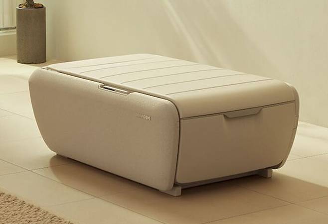 세라젬 마스터 V9 기기를 접은 모습. 접었을 시 제품 사이즈는 길이가 80㎝ 감소한 129㎝, 폭 77.7㎝, 높이 44㎝다.