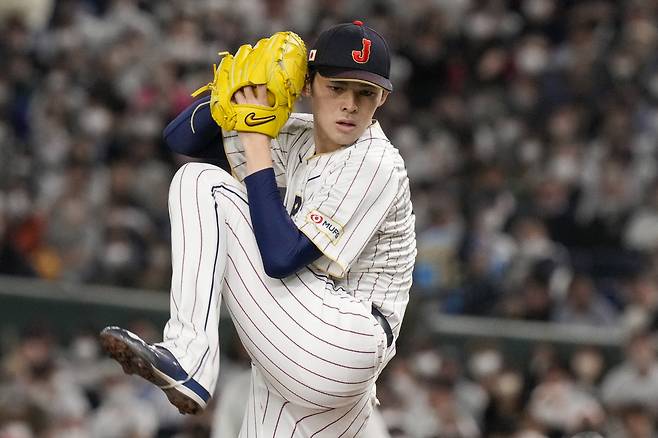 FILE - Roki Sasaki of Japan pitches during their Pool B game against the Czech Republic at the World Baseball Classic at the Tokyo Dome in Tokyo, on March 11, 2023. (AP Photo/Eugene Hoshiko) FILE PHOTO
<저작권자(c) 연합뉴스, 무단 전재-재배포, AI 학습 및 활용 금지>