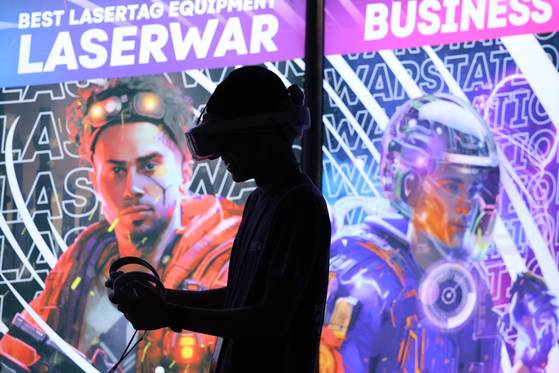 A visitor tries their hand at a virtual reality device at the Metaverse Expo 2024 held at Coex, southern Seoul, on June 26. [NEWS1]