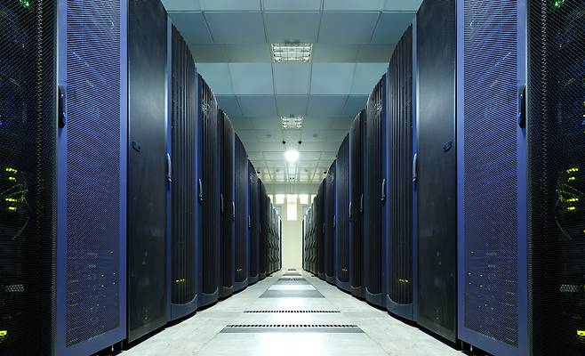 A data center with rows of different communication equipment (123rf)