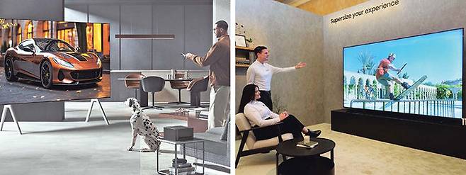 ‘LG 올레드 에보’(왼쪽 사진)와 삼성전자 115형 네오(NEO) QLED. 양사 모두 인공지능(AI)을 기반으로 사용자에 맞춰 콘텐츠를 추천하고, 화질·음질을 정교하게 조정하는 등 한층 똑똑해진 TV를 선보였다. LG전자·삼성전자 제공