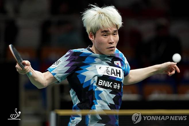 혼성단체 월드컵 경기를 펼치는 장우진 [ITTF 홈피 제공. 재판매 및 DB 금지]