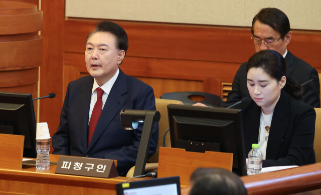 ▲윤석열 대통령이 13일 서울 종로구 헌법재판소 대심판정에서 열린 윤석열 대통령 탄핵심판 8차 변론기일에 출석해 있다. ⓒ연합뉴스