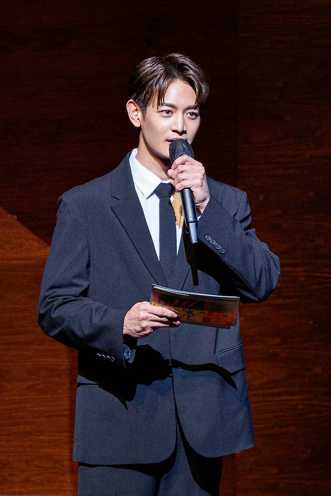 Minho of SHINee delivers opening remarks at SM Classics Live on Friday at the Seoul Arts Center.  (SM Entertainment)