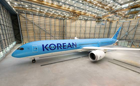 A Korean Air aircraft with a new logo and livery at a hanger in Busan [KOREAN AIR]