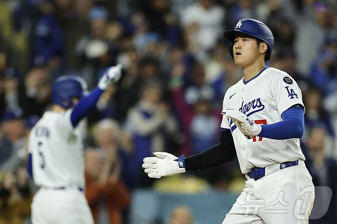 오타니 쇼헤이가 30일(한국시간) 열린 2025 메이저리그 디트로이트 타이거스전에서 2볼넷 2득점을 기록하며 LA 다저스의 7-3 역전승에 일조했다. ⓒ AFP=뉴스1