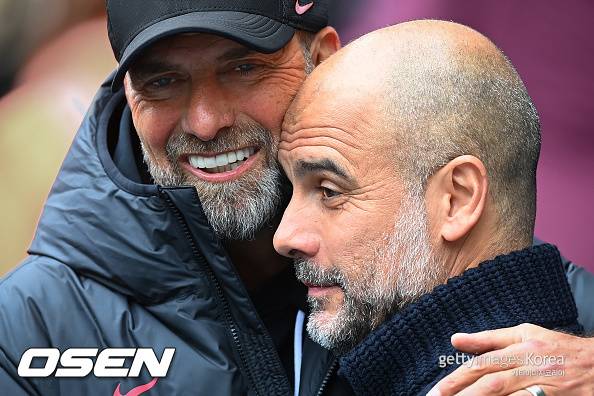 [사진] 위르겐 클롭 감독과 펩 과르디올라 ⓒGettyimages(무단전재 및 재배포 금지)