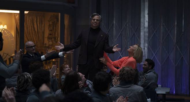 Mark Ruffalo (center) and Toni Collette (right) star in "Mickey 17." (Warner Bros. Pictures)