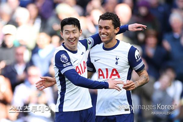 손흥민-존슨 / 사진=Gettyimages 제공