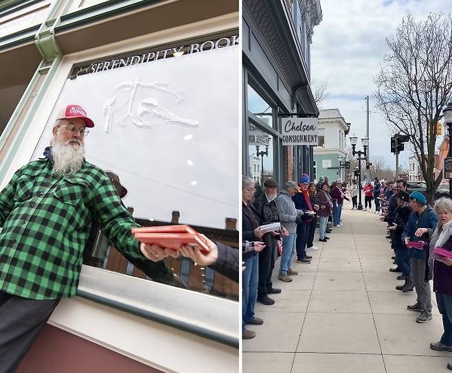미국 미시간주 작은 마을 첼시의 동네 책방 세렌디피티북스(Serendipity Books)의 지난 13일 이삿날 봉사자들이 인간띠를 만들어 한 블록 떨어진 새 매장으로 이사를 돕는 장면. AP연합뉴스, 세렌디피티북스 SNS 영상 캡처