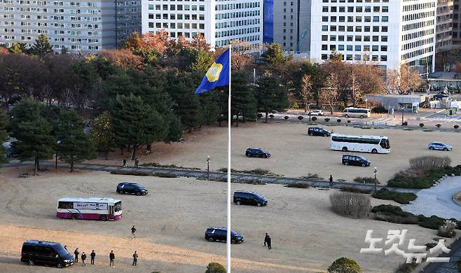 지난해 12월 6일 오후 헬기 착륙을 막기 위해 국회 잔디광장에 대형버스가 배치된 모습. 황진환 기자
