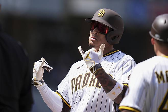 ▲ 시카고 컵스와 경기에서 타점을 올린 뒤 세리머니하는 매니 마차도. ⓒ연합뉴스/AP