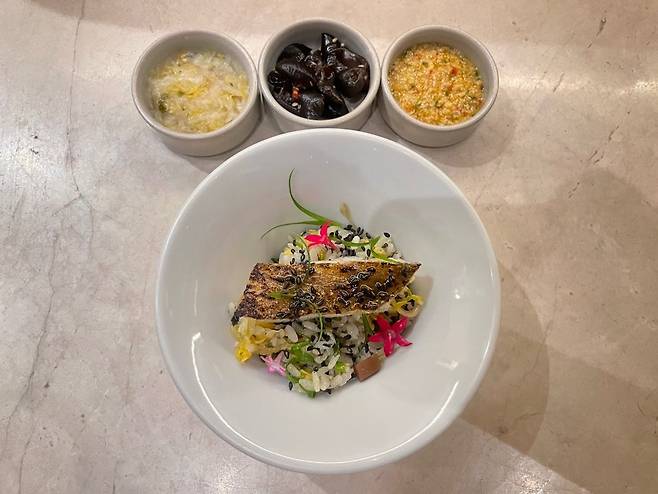 Gulbi, a dish made with lotus, dry-aged croaker and dubujang (Hong Yoo/ The Korea Herald)