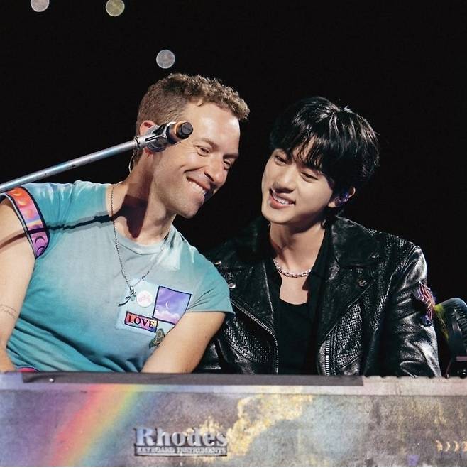 Chris Matin (left) of Coldplay and Jin of BTS sing "The Astronaut" at  the third show of the British band's "Music of the Spheres" concert in Korea, at Goyang Sports Complex Stadium in Gyeonggi Province, Saturday. (Jin's Instagram)