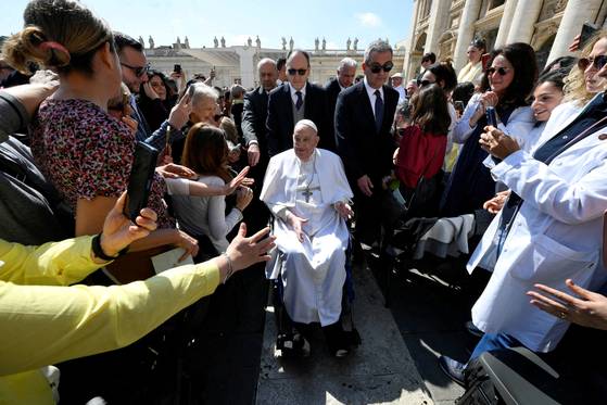 Pope Francis appears for the first time since his return to the Vatican, on the day of a Mass for Jubilee of Sick and Health Care Workers in Saint Peter's square, at the Vatican on April 6,. [REUTERS/YONHAP]