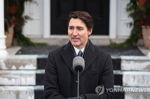 사임 발표하는 쥐스탱 트뤼도 전 캐나다 총리 [AFP 연합뉴스 자료사진. 재판매 및 DB 금지]