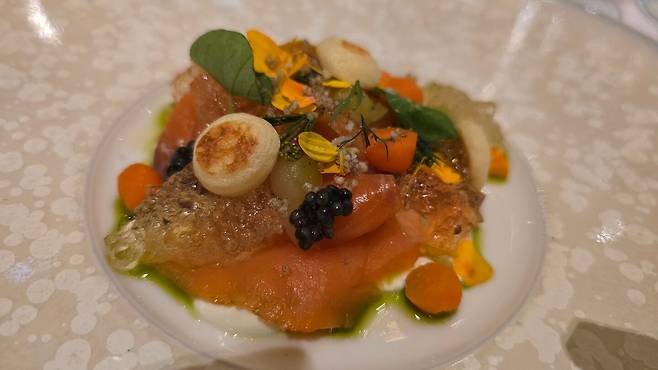 Smoked salmon paired with smoky Meursault jelly, pickles, and condiments. /STAY Seoul