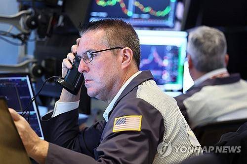 뉴욕증권거래소의 트레이더 [AFP 연합뉴스 자료사진. 재판매 및 DB 금지]