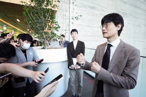 Lee Hae-jin, founder of Naver, answers questions from reporters after attending Naver's 26th annual general shareholder meeting at the Naver Green Factory headquarters building in Seongnam, Gyeonggi, on March 26. [NAVER]