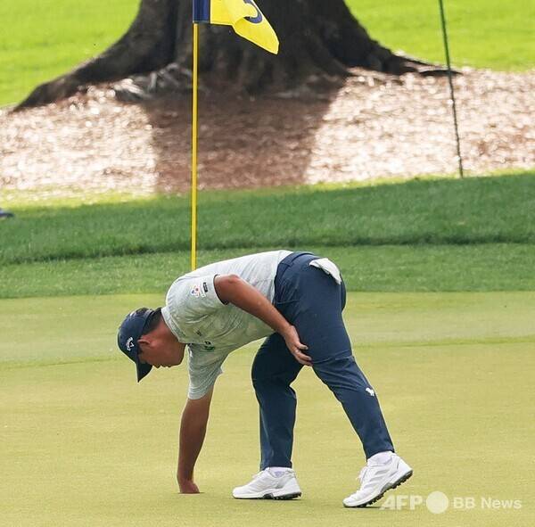 미국프로골프(PGA) 투어 2025시즌 두 번째 메이저 대회 PGA챔피언십에 출전한 김시우 프로가 2라운드 후반 6번홀에서 홀인원을 기록한 모습이다. 사진제공=ⓒAFPBBNews = News1