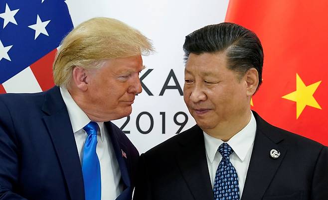 U.S. President Donald Trump meets with China's President Xi Jinping at the start of their bilateral meeting at the G20 leaders summit in Osaka, Japan, June 29, 2019. [REUTERS/YONHAP]