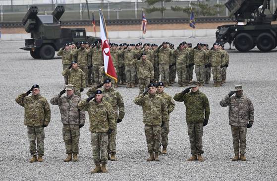 U.S. soldiers salute during a change-of-command ceremony for the United Nations Command, Combined Forces Command and the United States Forces Korea (USFK) at Camp Humphreys in Pyeongtaek, Gyeonggi, on Dec. 20, 2024. [AP/YONHAP]