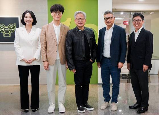 From left: Naver CEO Choi Soo-yeon, Naver Chair Lee Hae-jin, Nvidia CEO Jensen Huang, Nvidia Executive Vice President Jay Puri and Naver Cloud CEO Kim Yoo-won pose for a photo at Nvidia's office in Taiwan. Naver said May 23 that its top executives met with senior leadership at Nvidia’s Taiwan office on May 22 to discuss the expansion of sovereign AI initiatives and plans for large-scale AI data centers. [NAVER CLOUD]