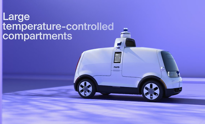미국 뉴로(Nuro)가 시험 운행하고 있는 자율주행 전기택배차. 문을 위로 열어 많은 양의 택배물건을 실을 수 있다.