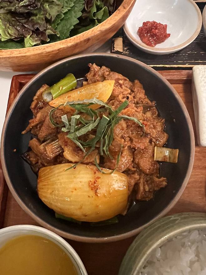 Jeyuk bokkeum, or spicy stir-fried pork seasoned with gochujang (Korean chile paste), served at Grandmother's Recipe in Seoul's Seongsu-dong. (Park Jun-hee/The Korea Herald)