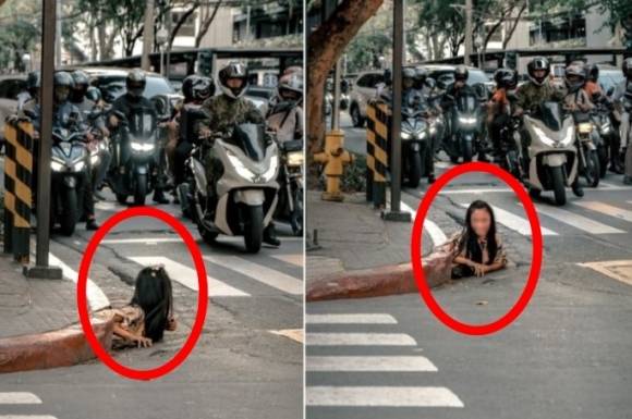 지난 26일 필리핀 마닐라의 금융 중심지인 마카티 지역의 대로변 하수구에서 여성이 기어 나오는 모습이 포착됐다. 인스타그램 캡처
