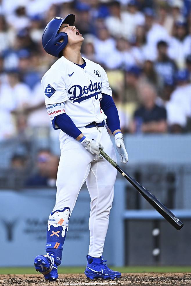 김혜성이 8회말 헛스윙 삼진을 당한 뒤 고개를 젖히고 아쉬워하고 있다. Imagn Images연합뉴스