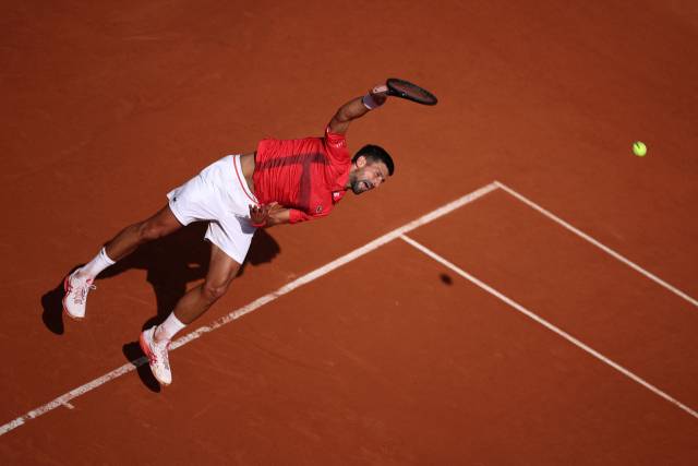 캐머런 노리에게 서브를 하는 노바크 조코비치. AFP연합뉴스