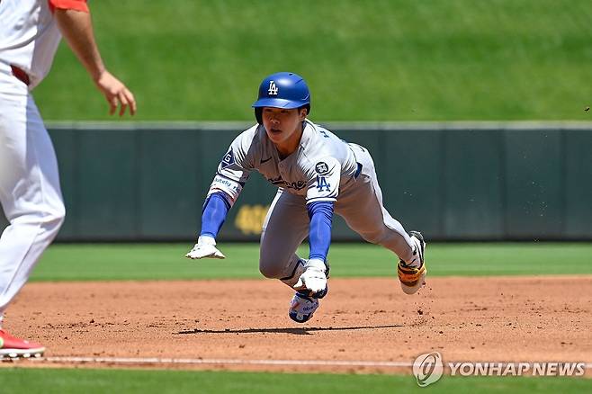 3루에 슬라이딩하는 김혜성 [게티이미지/AFP=연합뉴스]